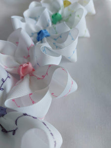 White Bows with Pastel Colour Embroidery